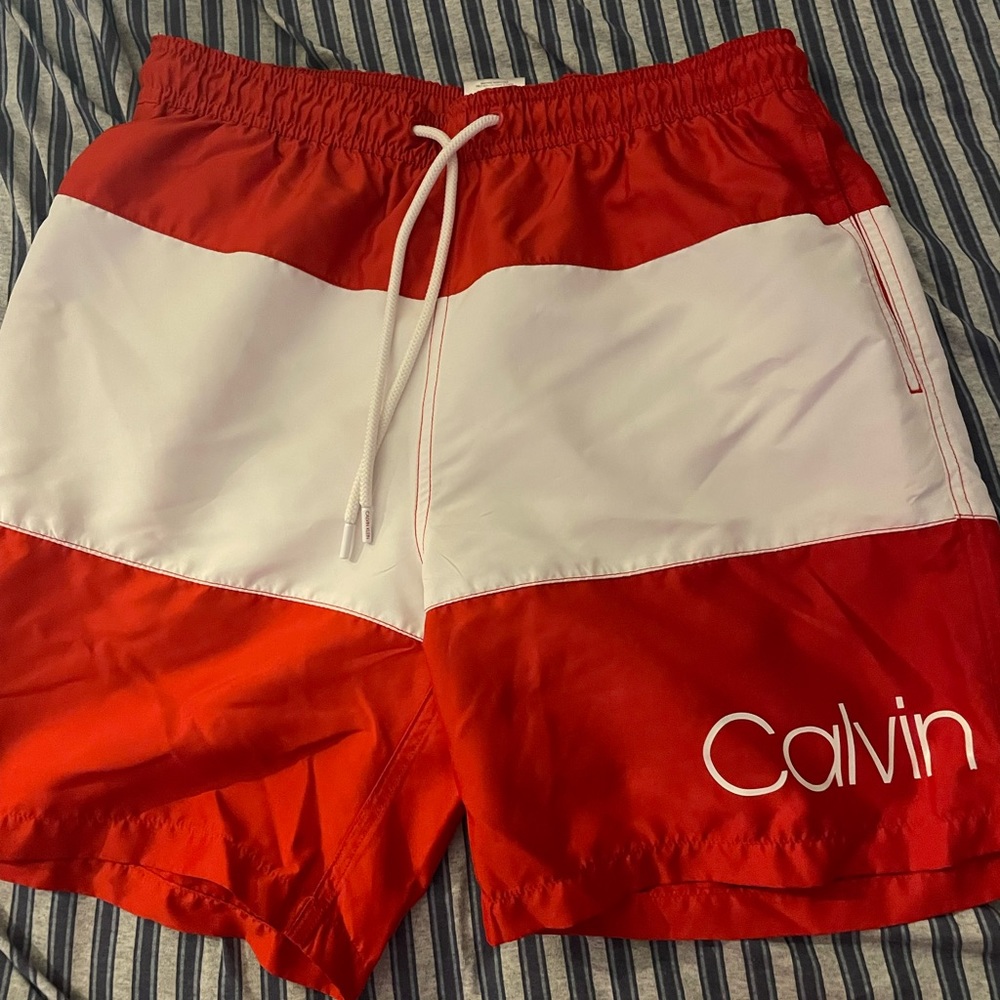 Calvin Klein swim shorts.
